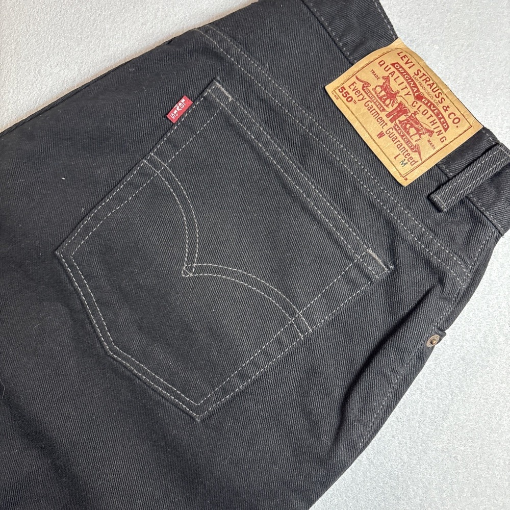 VTG Levis 550 jeans relaxed fit tapered Leg black denim womens 12 R Made In USA